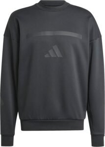 A black Adidas sweatshirt with a minimalist design, featuring the Adidas logo and subtle horizontal detailing on the chest.