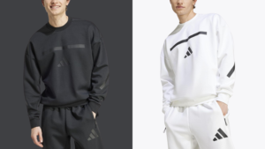 Two models showcasing Adidas sweatshirts in black and white colors with subtle Adidas logo designs, highlighting premium quality and modern style.